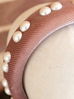 Close up of the faux pearls.